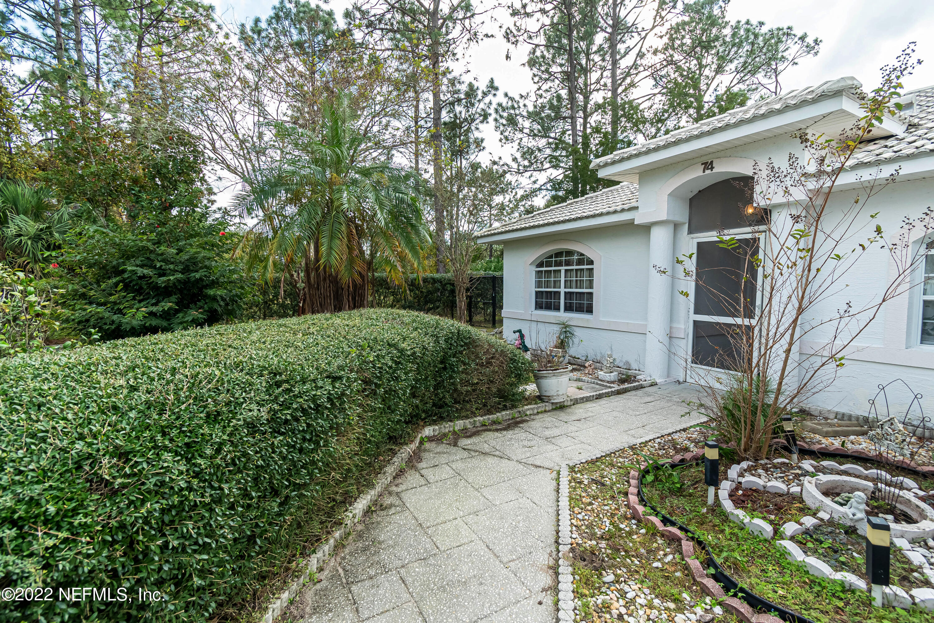 74 Raintree Place Palm Coast, FL 32164 - Photo 4 of 51 frontyard7
