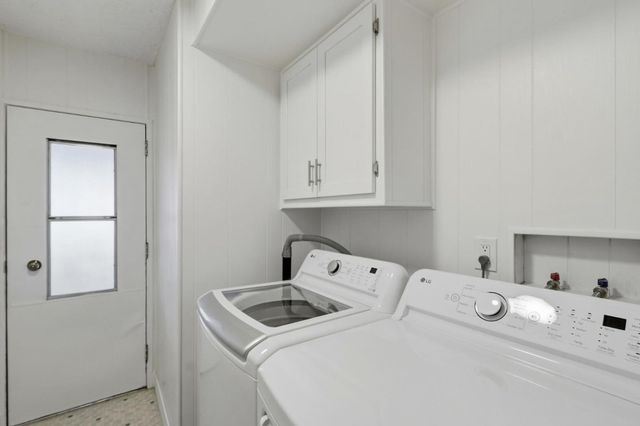 a view of a porch with wooden floor
