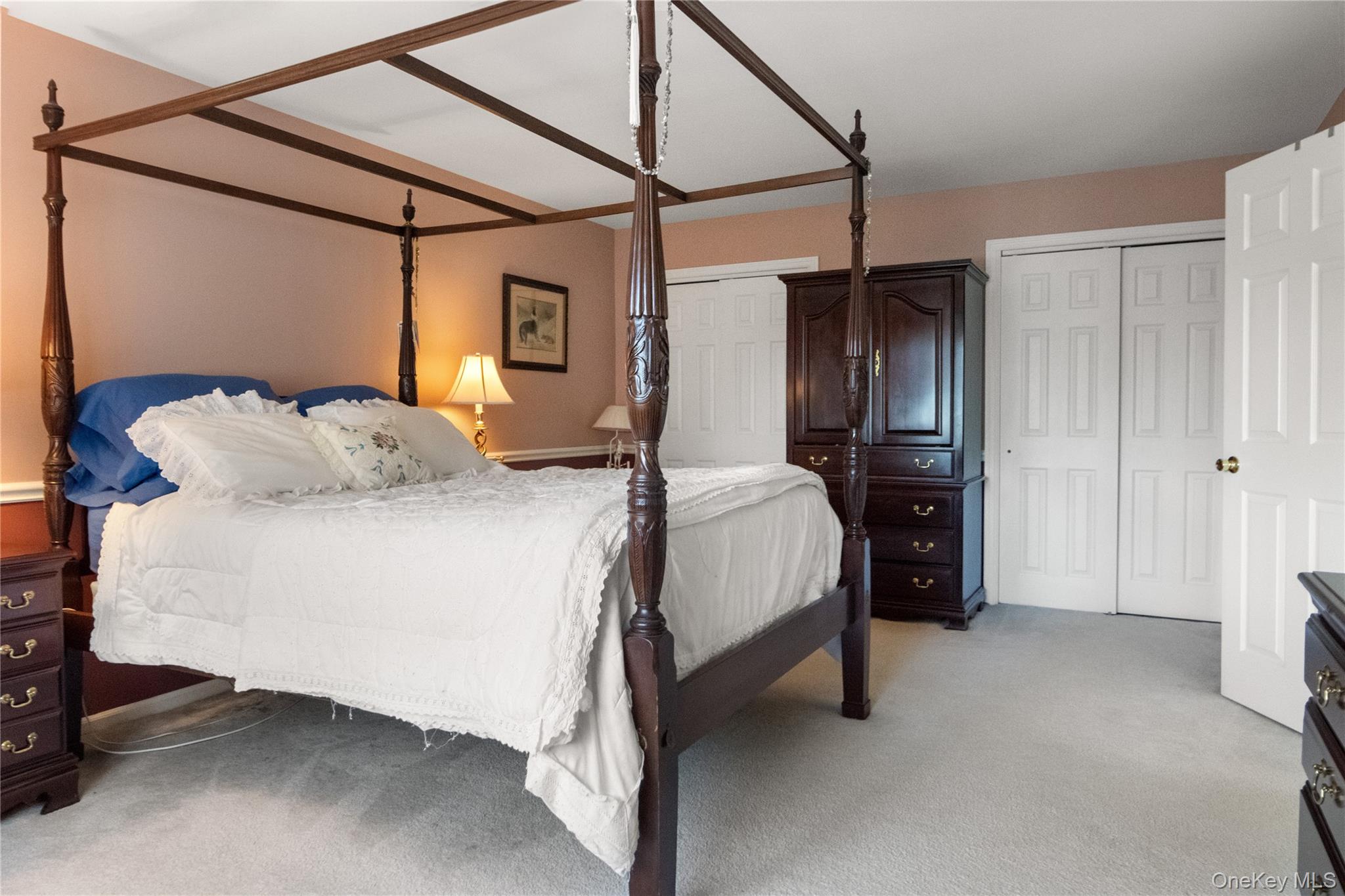 214 West Mombasha Road Monroe, NY 10950 - Photo 30 of 43 a bedroom with a bed and a table