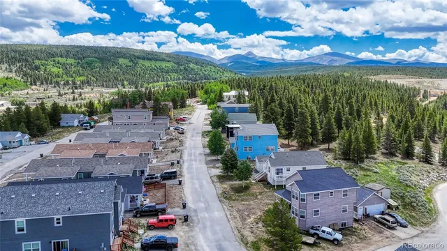 an aerial view of a houses with outdoor space