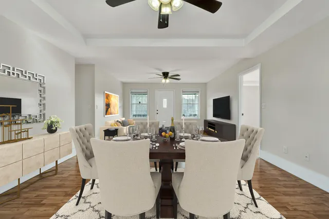 a view of a dining room with furniture