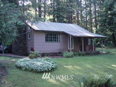 8678 Silver Lake Road Maple Falls, WA 98266 - Photo 1 of 1 a front view of a house with garden