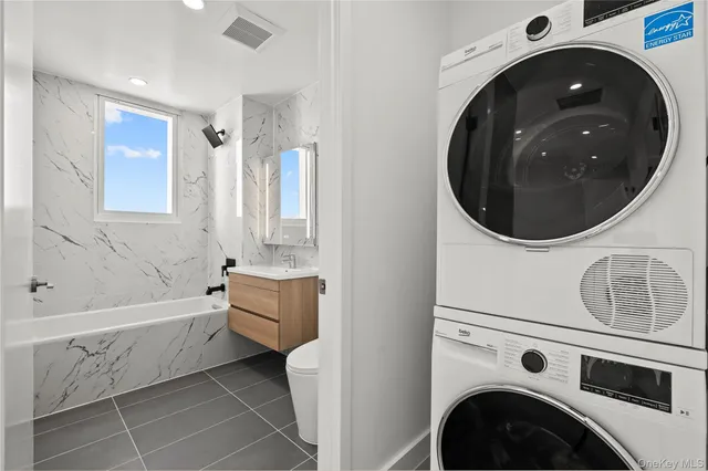 a view of room with wooden floor