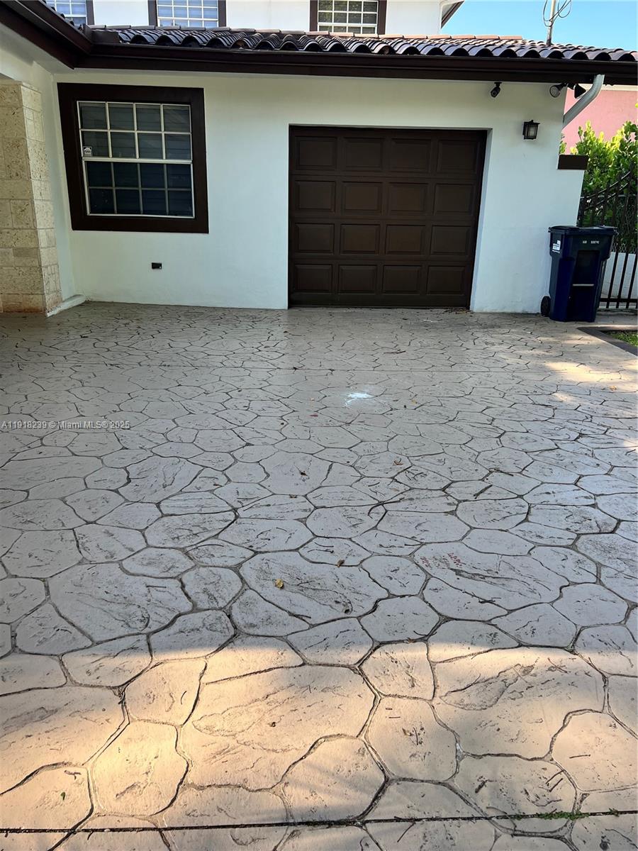 6284 Southwest 26th Street Miami, FL 33155 - Photo 18 of 25 a front view of a house