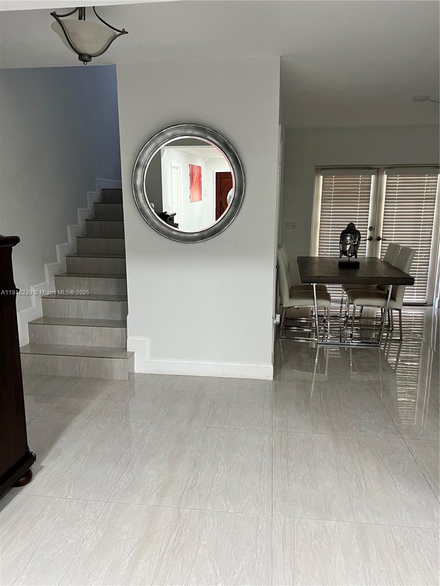 6284 Southwest 26th Street Miami, FL 33155 - Photo 21 of 25 a view of a livingroom with furniture and windows
