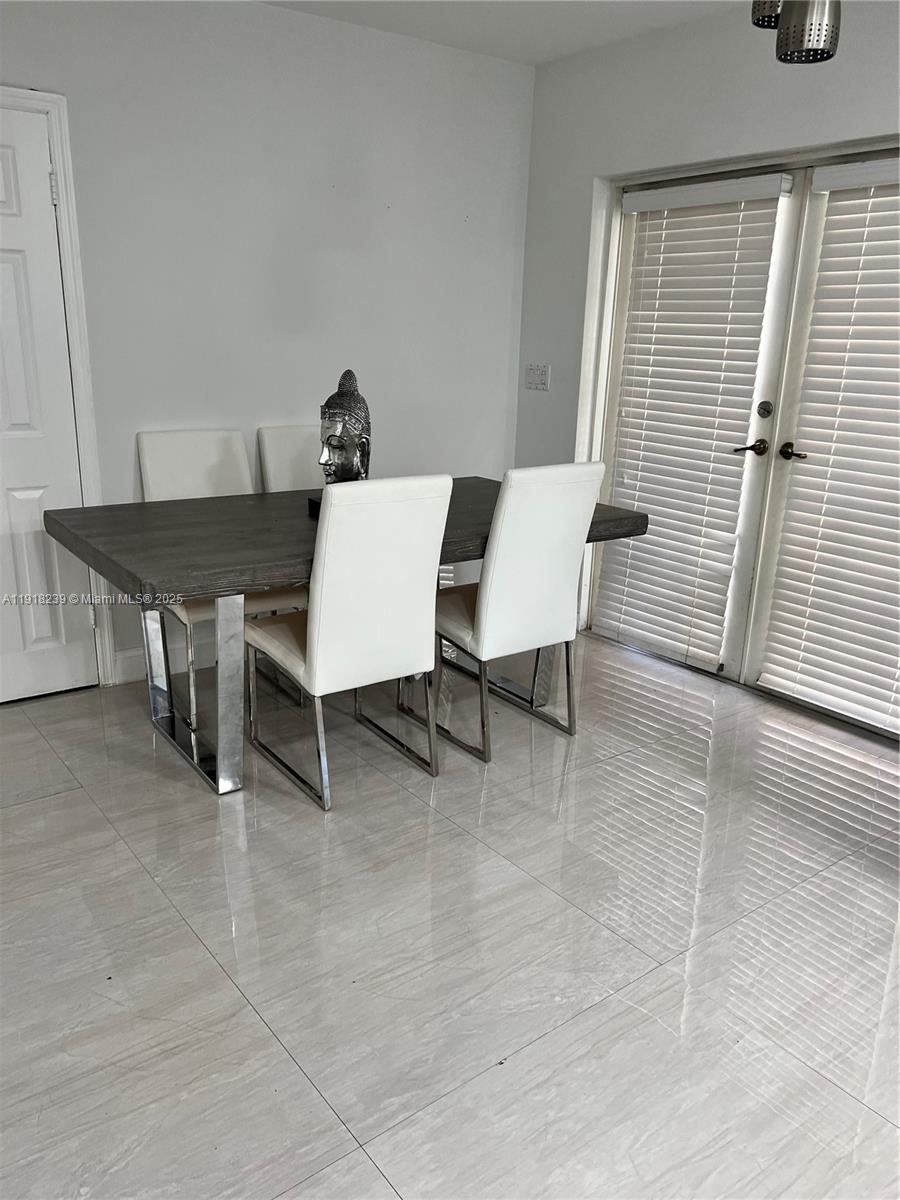 6284 Southwest 26th Street Miami, FL 33155 - Photo 25 of 25 a view of a dining room with furniture