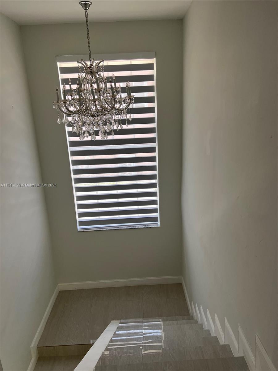 6284 Southwest 26th Street Miami, FL 33155 - Photo 9 of 25 a view of empty room with window