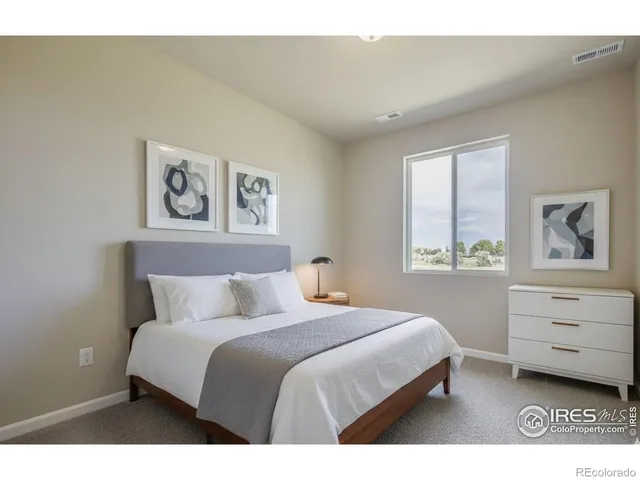 an aerial view of a house with a ocean view