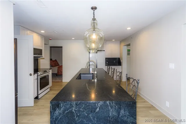 $695,000 | 222 Park Pl Lane, Unit 1C, Kaiser, MO 65047