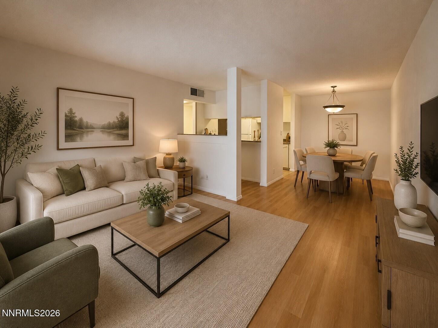 2955 Lakeside Drive, Unit 120 Reno, NV 89509 - Photo 2 of 21 a living room with furniture and wooden floor
