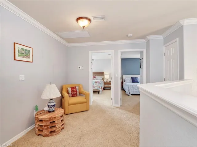 a bedroom with furniture and a couch