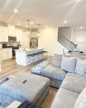a living room with furniture and a couch