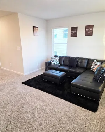 a room with bed and a window