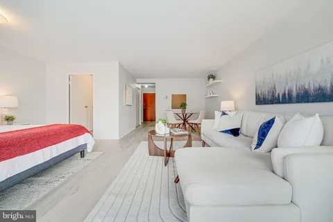 a living room with furniture and a couch