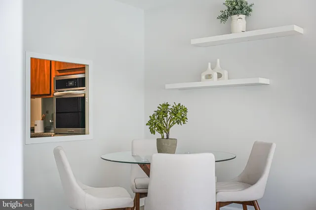 a view of a dining room with furniture