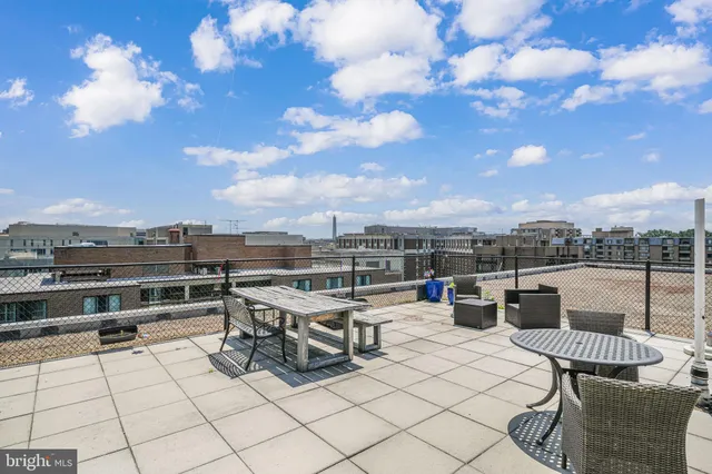 a view of a terrace with furniture and stove