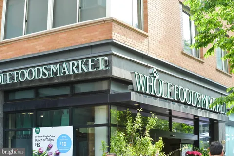 a variety of fruits and vegetables with retail shops