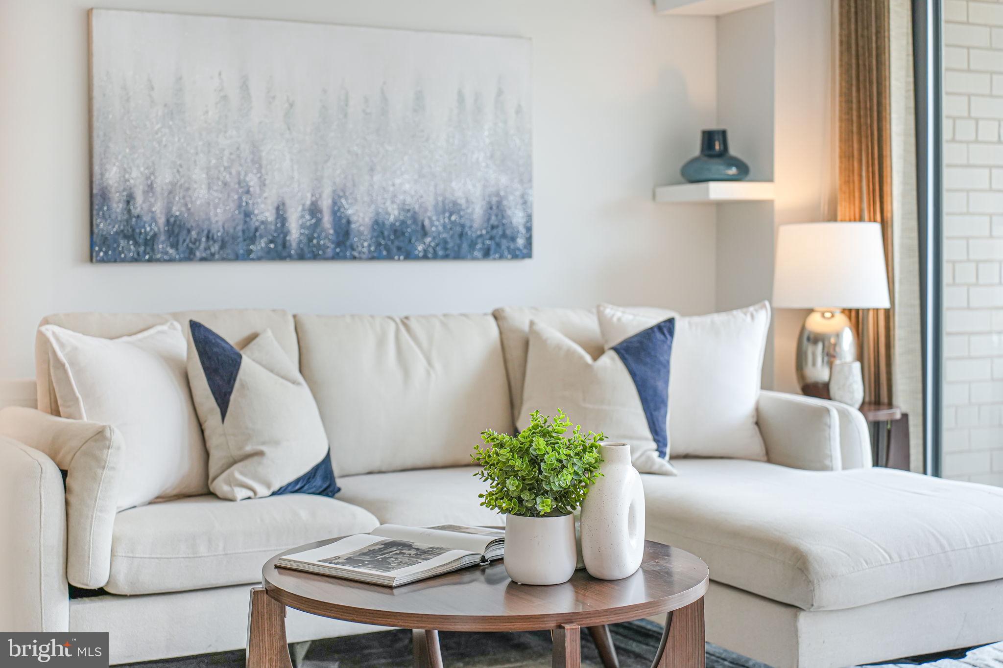 730 24th Street Northwest, Unit 612 Washington, DC 20037 - Photo 6 of 39 a living room with furniture flowerpot and a window