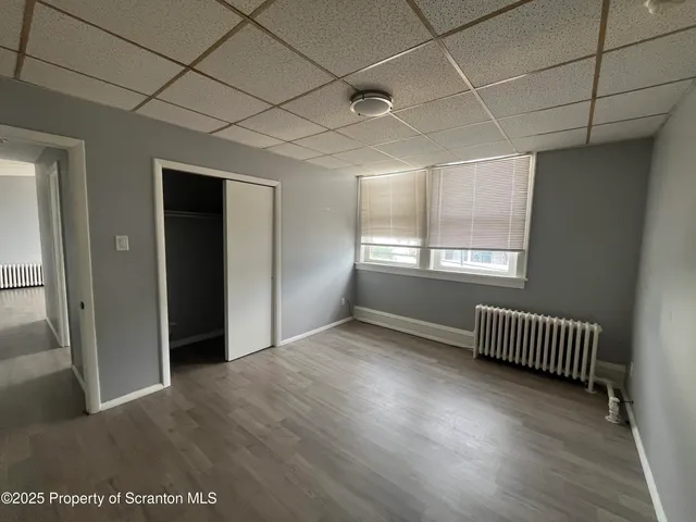 a bathroom with a sink toilet and mirror