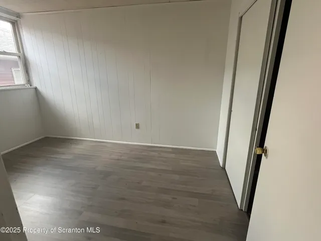 a kitchen with a sink stove and refrigerator