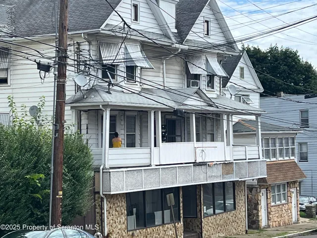 a street view with a building in the background