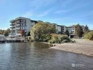a view of a lake with a building in the background