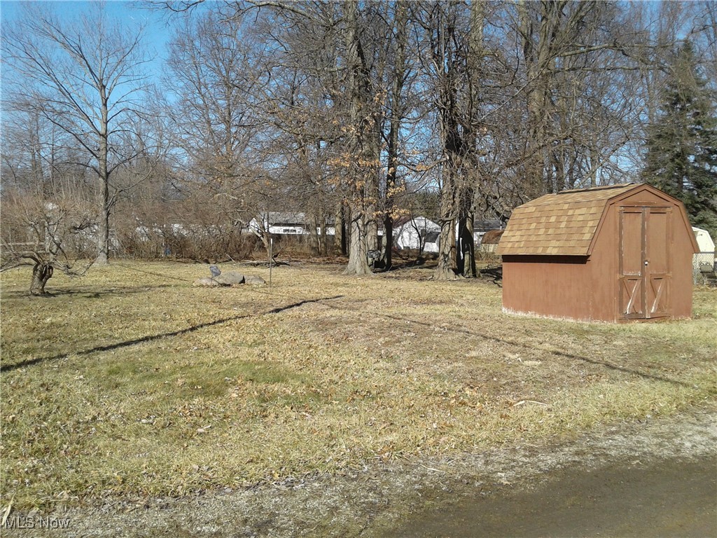 332 Claremont Road Vermilion, OH 44089 - Photo 30 of 35 View of yard with a storage shed