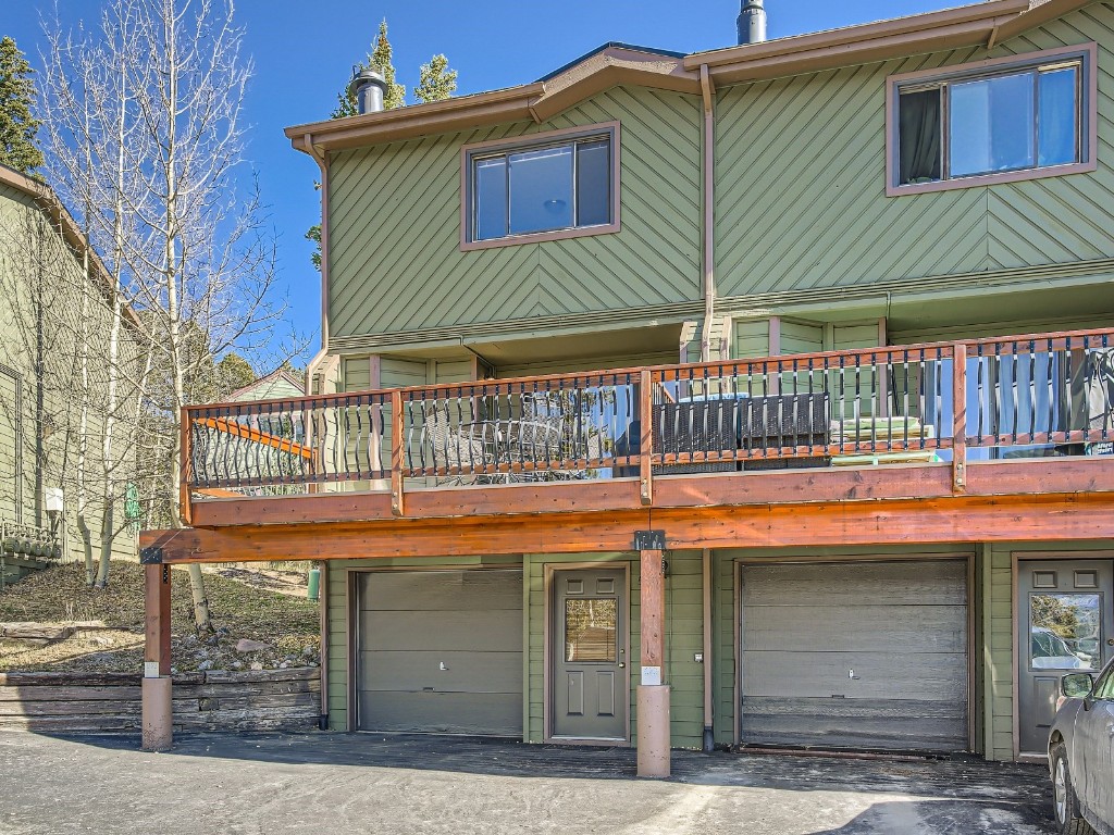 52 Club House Road, Unit 54 Breckenridge, CO 80424 - Photo 1 of 28 a view of a house with a balcony