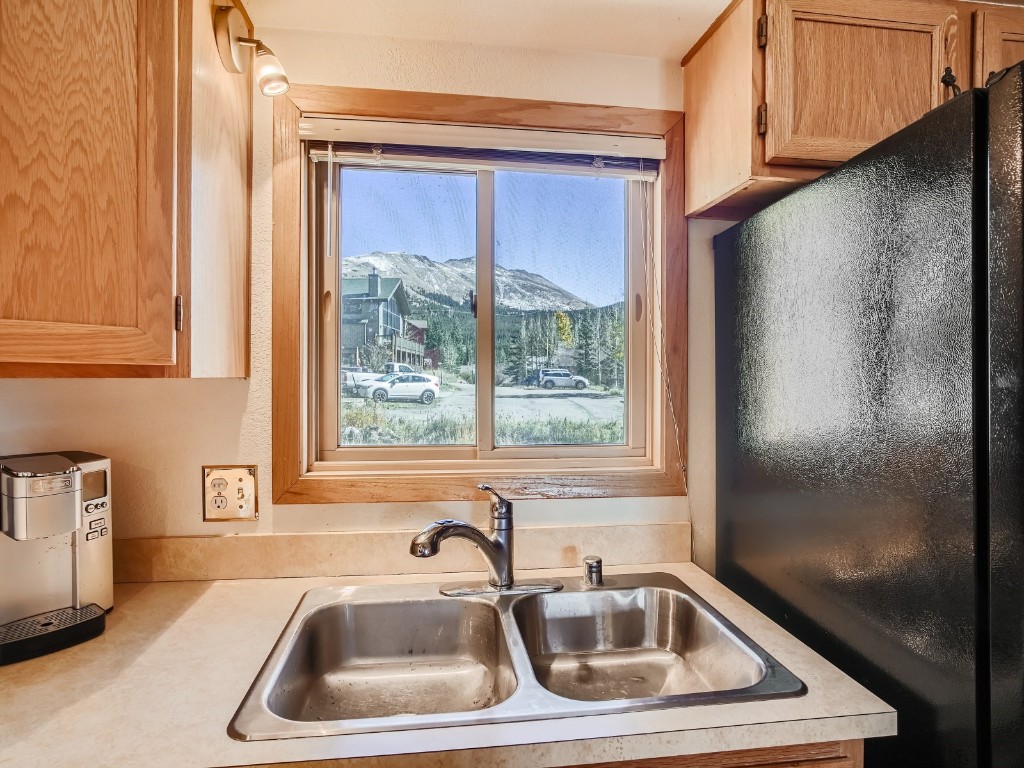 52 Club House Road, Unit 54 Breckenridge, CO 80424 - Photo 11 of 28 a bathroom with sink and window