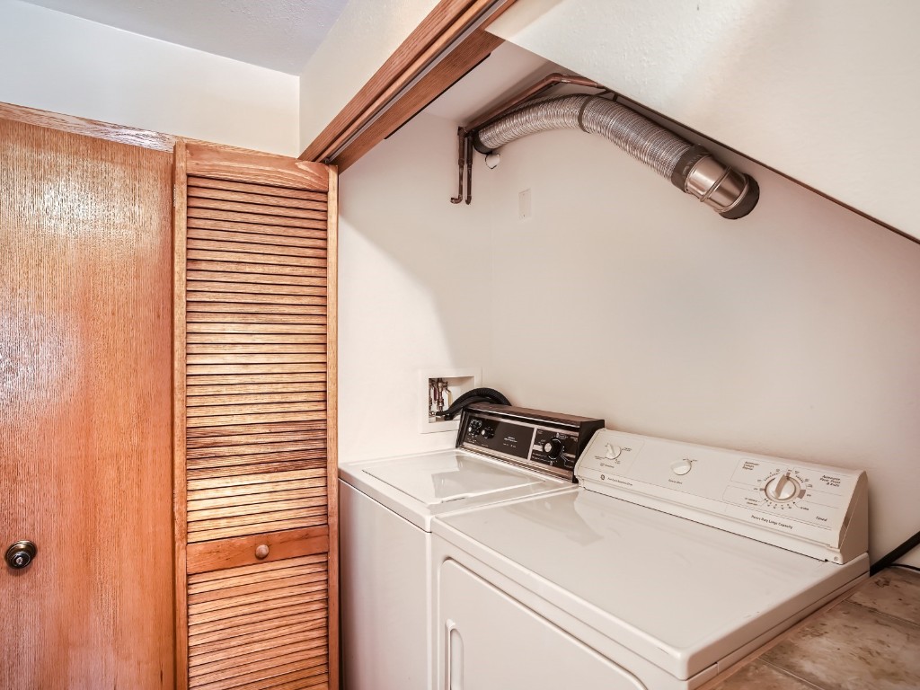 52 Club House Road, Unit 54 Breckenridge, CO 80424 - Photo 21 of 28 a utility room with dryer and washer