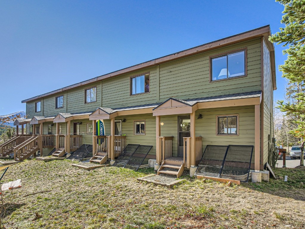 52 Club House Road, Unit 54 Breckenridge, CO 80424 - Photo 25 of 28 a view of a house with a backyard