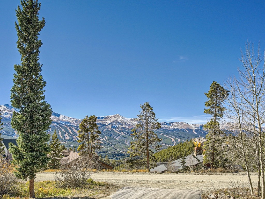 52 Club House Road, Unit 54 Breckenridge, CO 80424 - Photo 27 of 28 a view of a town with mountains in the background