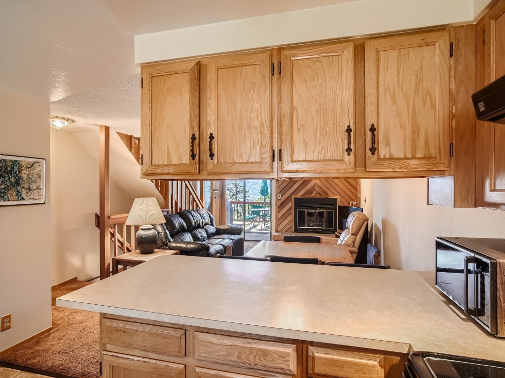 52 Club House Road, Unit 54 Breckenridge, CO 80424 - Photo 10 of 28 a view of kitchen with wooden floor