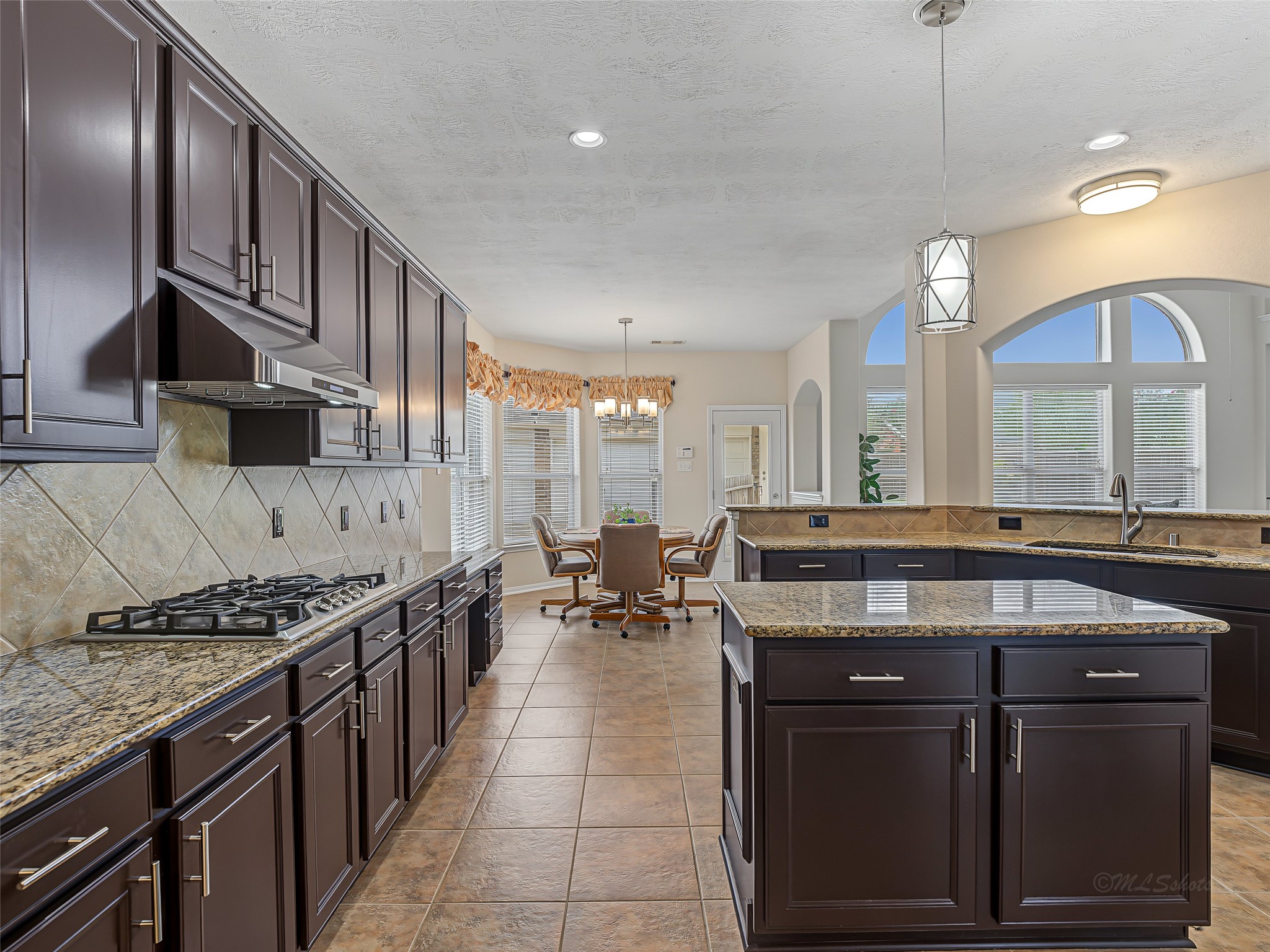 2210 Fox Path Katy, TX 77494 - Photo 19 of 47 This grand view showcases a beautifully configured culinary space designed with function and high-end aesthetics in mind.