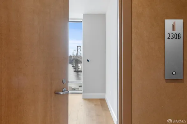 en empty room with sliding door and mountain view