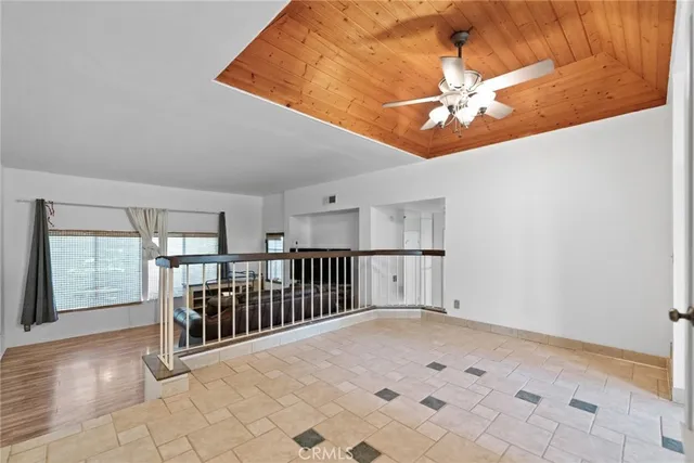 a view of a hallway with entryway of a house