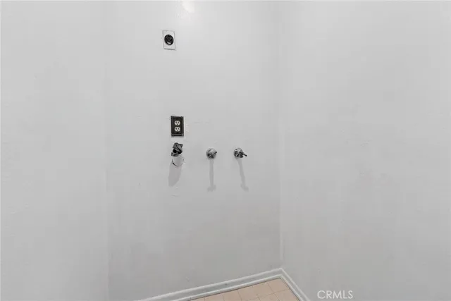 a view of a bedroom from a hallway