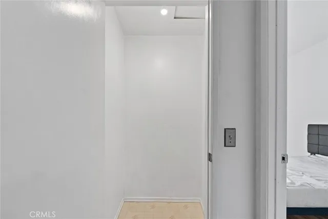 a bathroom with a double vanity sink mirror and shower