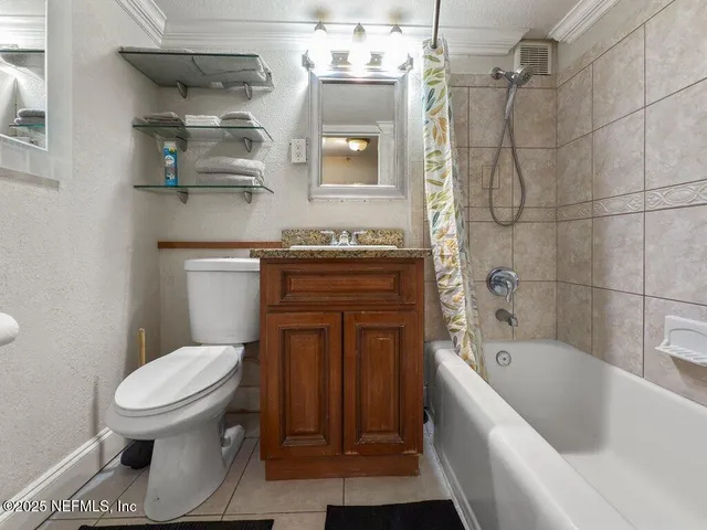 a view of a building with a yard