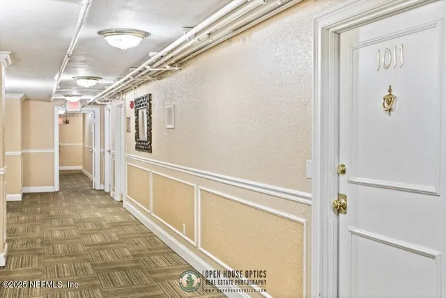 a view of a hallway with entryway