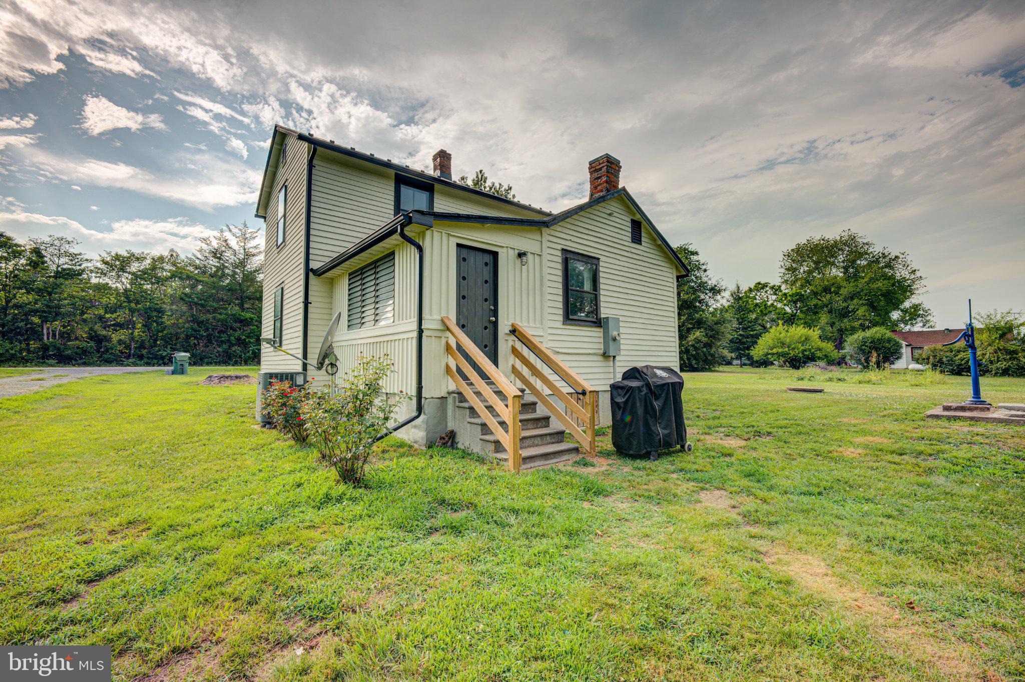 24177 Rapidan Road Mitchells, VA 22729 - Photo 27 of 43 Charming home with lush green surroundings.