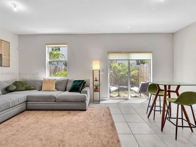 a living room with furniture and a couch