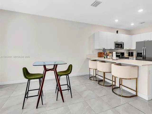 a front view of a house with yard