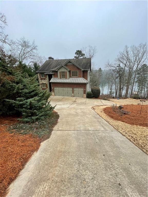 4596 Lakeview Lane Gainesville, GA 30504 - Photo 1 of 1 a front view of a house with a yard