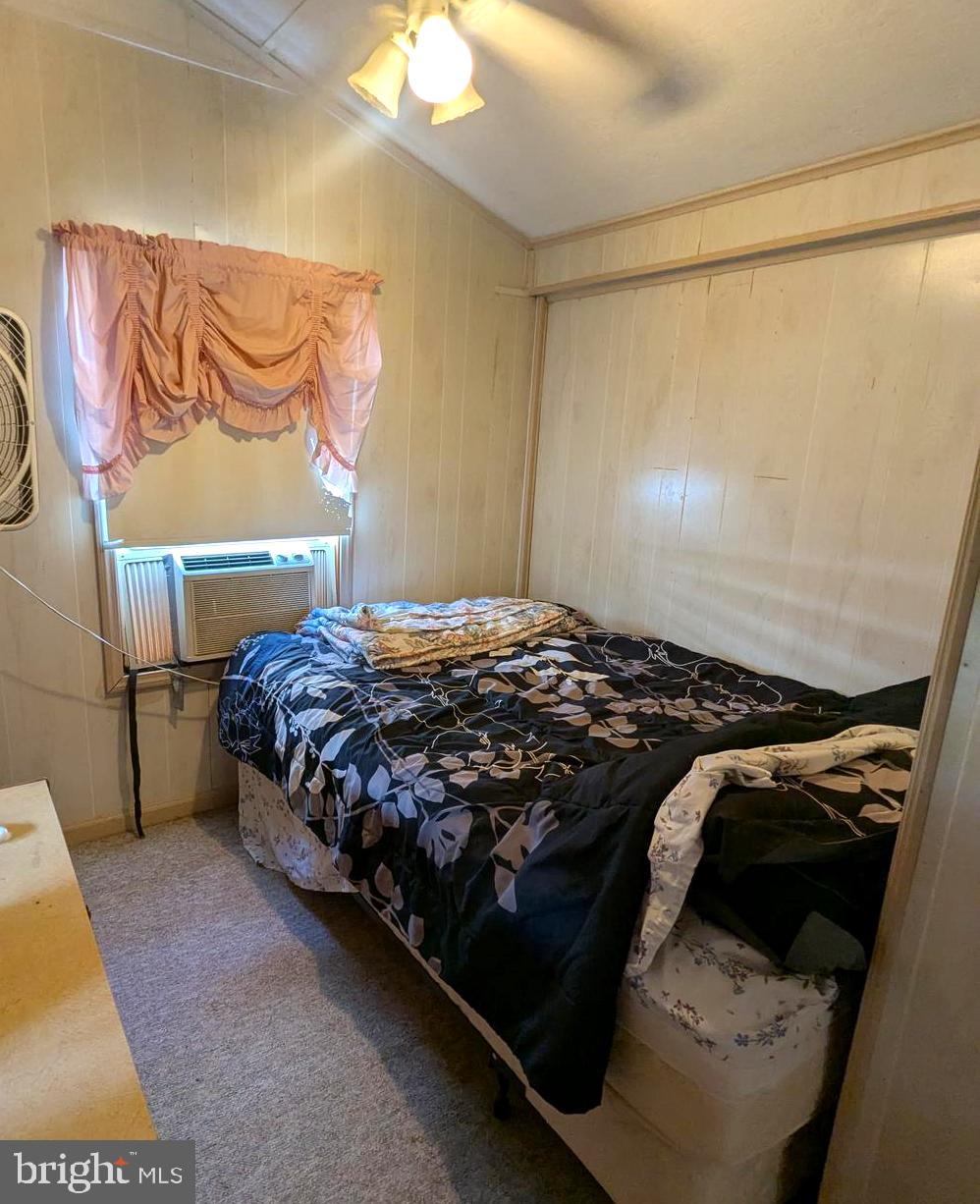 41 Ranger Road Falling Waters, WV 25419 - Photo 5 of 9 a bedroom with a bed and a window