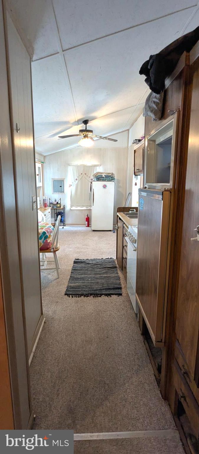 41 Ranger Road Falling Waters, WV 25419 - Photo 6 of 9 a view of a refrigerator in kitchen and wooden floor