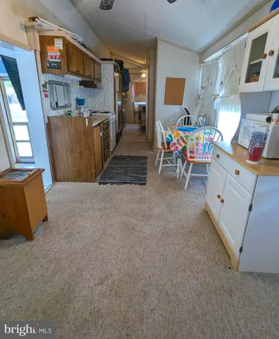 a room with furniture and a flat screen tv