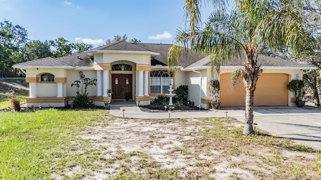 $530,000 | 16402 Fringe Tree Drive, Spring Hill, FL 34610