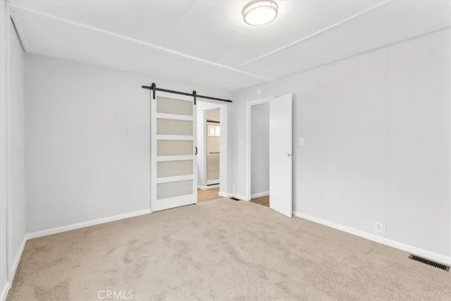 a view of a bathroom with a sink and mirror