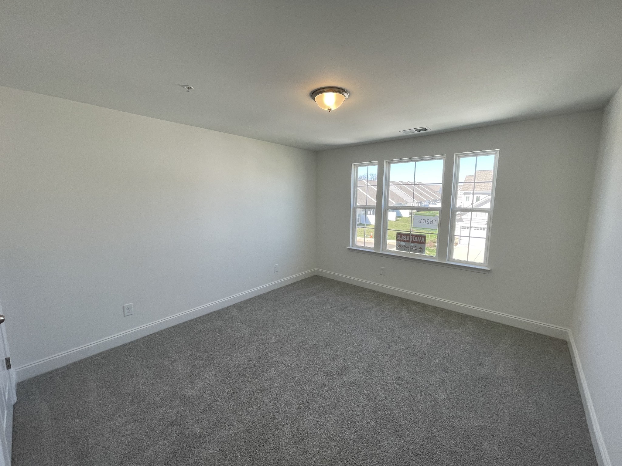 1156 June Wilde Ridge Spring Hill, TN 37174 - Photo 13 of 20 an empty room with a window